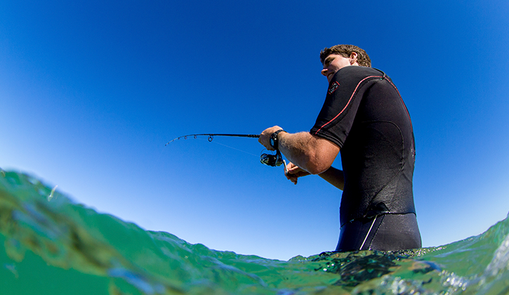 man fishing in hat head